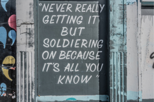 A chalkboard sign with a message that reflects the tone of the corresponding author, whose letter to Borderline Personality Disorder was published to the Dear Diagnosis literary project.