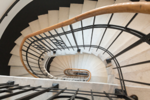 A downward spiraling staircase used to capture the tone of the associated letter written to Depression for Dear Diagnosis